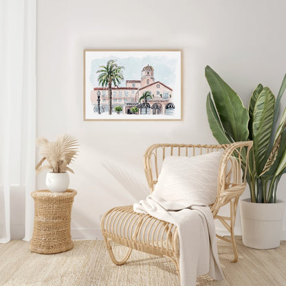 Watercolor art print of La Valencia Hotel in La Jolla, featuring iconic Spanish-style architecture, palm trees, and vintage charm. displayed in a bright, airy room with a coastal-inspired aesthetic. Perfect for San Diego decor lovers and coastal-inspired interiors